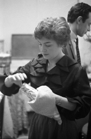 Greta cleaning glasses