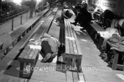 People asleep in the stand