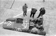 #43 O.S.C.A. Sport 1000 (David Cunningham and Ed Hugus) in the pits from above, with the bonnet open