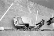 #42 Austin-Healey Sprite Sebring (John K. Colgate Jr and Paul Hawkins) in the pits