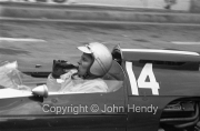 Formula 1 - #14 Cooper-Climax T14 (Bruce McLaren) celebrating with a bottle of Coke after winning