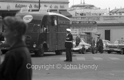 Police directing Cooper team truck