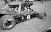 F1 - #1 Lotus-Cosworth 76 (Ronnie Petersen) being wheeled through the paddock