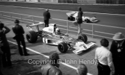 F1 - #6 McLaren-Cosworth M23 (Denny Hulme) leaving the pits