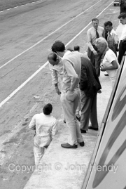 Chris Nixon and Stirling Moss in the pits