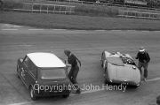 Team #21 Mini 7 Club A, Car C - Cooper-Mini 997cc John Whitmore/Steve McQueen  at the start. Also Team #8 AC Owners/Frazer Nash, Car E - Frazer Nash 1971cc, R.Dilley