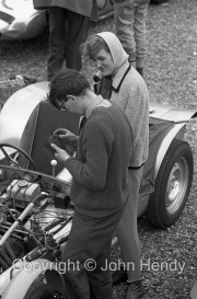Car receiving attention in the paddock