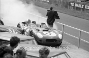 Team #1 Jaguar Drivers A, Car A - Lister-Jaguar (Roger Mac) returning to the pits, smoking considerably