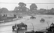 Cars racing in the wet
