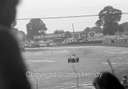 Cars coming round Woodcote corner