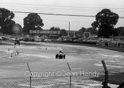Cars coming round Woodcote corner