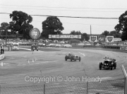 Cars coming round Woodcote corner