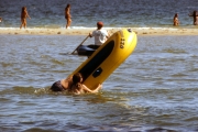 Fat frenchman falling out of dingy