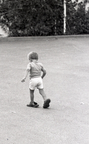 Toddler in borrowed shoes