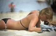 English girl in black bikini