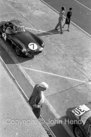 Qualifying - #7 Aston Martin DBR1/300 (Roy Salvadori and Jim Clark) in the pits. Also #30 AC Ace Aigle/ Bristol (Andre Wicky and Georges Gachanang)