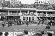 Pits before the start, by the Alfa Romeo garage (#40 Alfa Romeo Giulietta SV Conrero 1150 - Bernard Consten and Francesco de Leonibus)