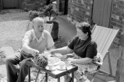 Katie and Bernard having tea in the garden at Cottingham