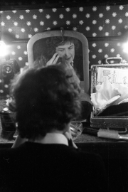 Greta applying makeup