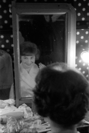 Greta applying makeup