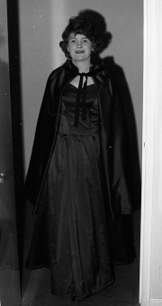 Greta in dress and cloak, for the Hospital Ball