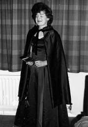 Greta in dress and cloak, for the Hospital Ball