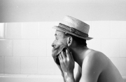 John in the bath. In a hat.