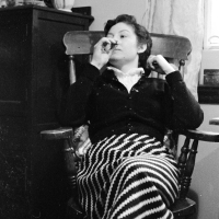 Edith at tea in hostel