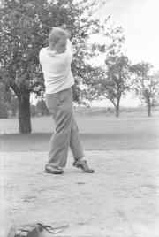 Robinson playing golf