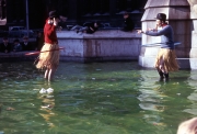 Hula-Hooping in the Fountain