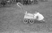 Little girl and pram