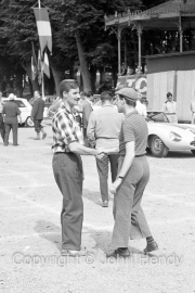 Graham Hill and Gerard Crombac meet at Scrutineering