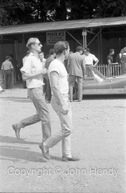 John Whitmore and Innes Ireland at Scrutineering