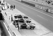 Triumph TR4 S in the pits - #25 (Marcel Becquart and Mike Rothschild), #26 (Peter Bolton and Keith Ballisat), #27 (Les Leston and Rob Slotemaker)