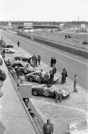 Ferraris in the pits - #11 Ferrari 250 TRI/61 (Willy Mairesse and Mike Parkes). #12 Ferrari 250 GT Experimental (Fernand Tavano and Giancarlo Baghetti). #23 Ferrari 246 P (Wolfgang von Trips and Richie Ginther).
