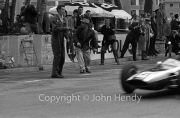 Formula 1 - #14 Cooper-Climax T60 (Bruce McLaren) passing the pits