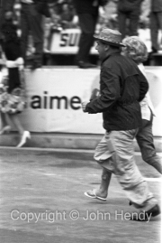 Spectators (?) running towards the pits after the race