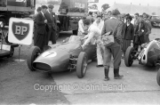 Formula 1 - #7 Aston Martin DBR4/250 (Maurice Trintignant) in the paddock, with Jill Harris etc