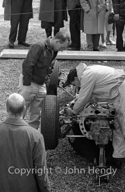 Formula 1 - Lola and John Surtees (probably #14 Lola Mk 4 - Climax V8) in the paddock