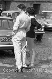 Driver and ladyfriend in the paddock