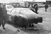 Sportscars - #35 Aston Martin DB4 GT Zagato 0182/R 1VEV (Mike Salmon) on a jack in the paddock