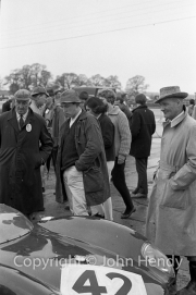 People in the paddock, admiring Sports Car #42 Lotus (JO Coundley)