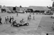 Formula 1 - #2 Cooper T53 - Climax (Bruce McLaren) and girls in the paddock