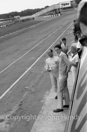 Chris Nixon and Stirling Moss in the pits