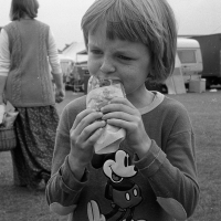 Simon eating a hot dog