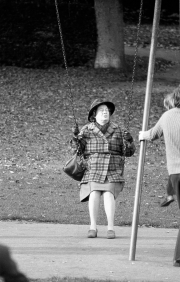 Lady of a certain age on a swing