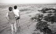 Greta and Simon watching the tide at Letty