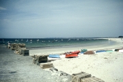 Jetty, beach and boats