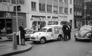 Olivetti van, with several police and traffic wardens