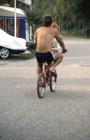 Two people on a bicycle